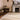 Syracuse wool rug in Natural, styled in a room