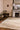 Syracuse wool rug in Natural, styled in a room
