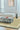Syracuse wool rug in Sauge, styled in a room