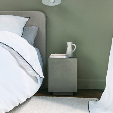 Astrakan wool rug, styled in a room