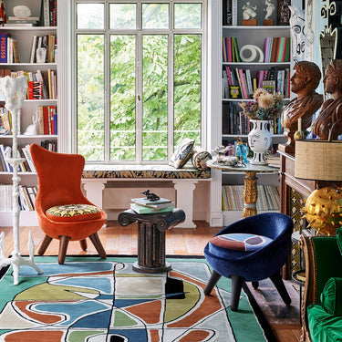 Caprice wool rug in Multi, styled in a room