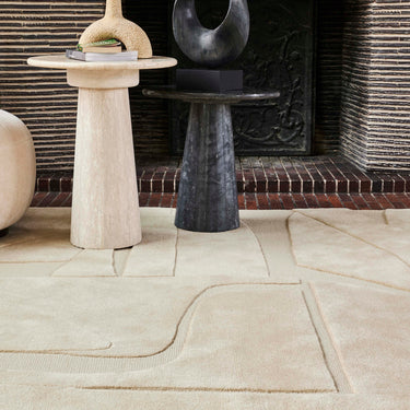 Collage wool rug in Beige, styled in a room