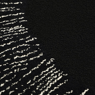 Eye Flower wool rug in Black, close-up detail