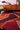 Muse wool rug in Red, styled in a room
