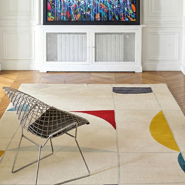 Stabile wool rug, styled in a room