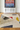 Stabile wool rug, styled in a room