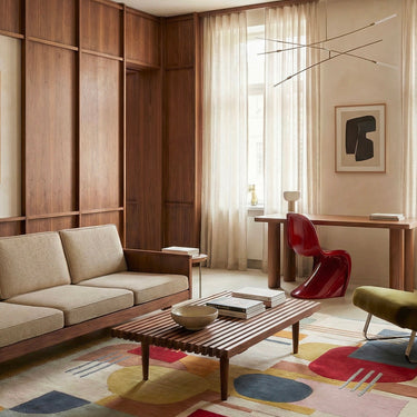 Artopia wool rug in Multi, styled in a room