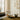 Damier wool rug in Green, styled in a room