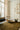Damier wool rug in Green, styled in a room
