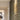 Torre sconces in Gold Foil lighting a room | Besa Lighting