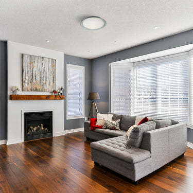 Tuca 15 foil ring flush mount in a bright family room | Besa Lighting