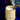 Ladenac Sicilian Cottage 330 g candle – candle styled against a deep blue backdrop