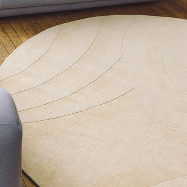 Volute Round wool rug in Beige, full view