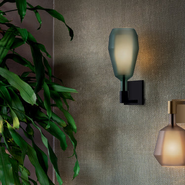 Penta MoM wall sconces in matt glass mounted on a wall