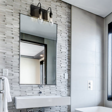 Wish teardrop glass lights above a bathroom mirror | Besa Lighting