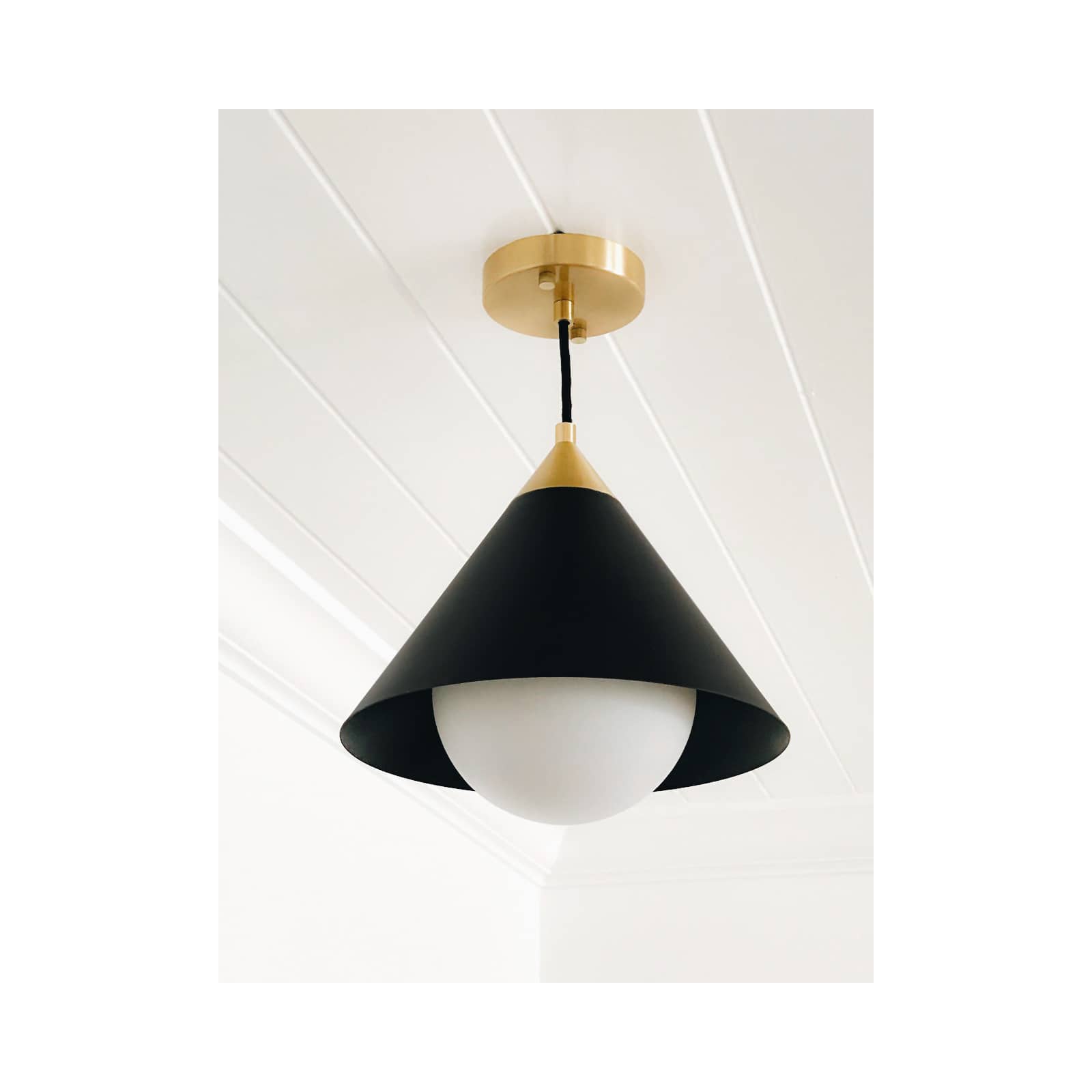 Hilton Pendant in Blackened Brass and Natural Brass by Regina Andrew