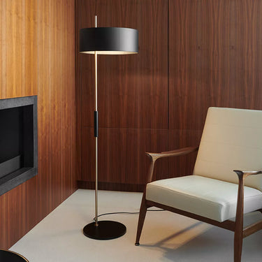 1953 Floor Lamp by Oluce with satin gold stem and black matte metal shade for modern living rooms