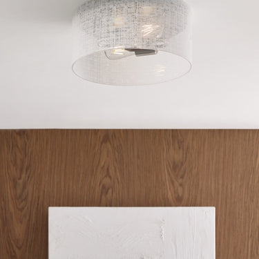 Modern flush mount ceiling light with textured linen glass and soft ambient glow