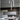 Vertical tube-shaped modern light, Lodes A-Tube Medium, perfect for creating architectural accents.