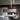 Lodes A-Tube Medium ceiling flush light in matte white, sleek modern LED fixture for modern kitchen island.