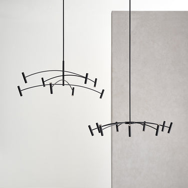 Modern matte black LED chandelier with adjustable arms and integrated lighting for dining or living rooms