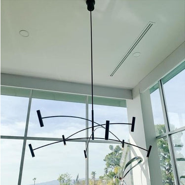 Modern 60-inch linear suspension chandelier with adjustable height and LED lights for high ceilings and open spaces

