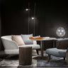 Agnoli Floor Lamp by Oluce with travertine marble base and adjustable satin nickel reflector
