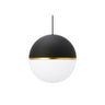 Akova Grande 13.7-inch globe pendant light in matte black aged brass over modern kitchen island workspace