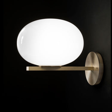Luxury Alba 176 wall light by Oluce perfect for boutique hotels and stylish interiors