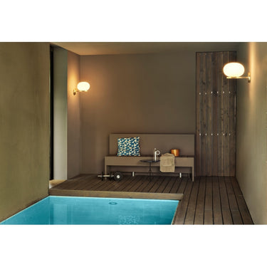 Modern wall-mounted Alba 176 lamp by Oluce with polished opaline glass and brass structure