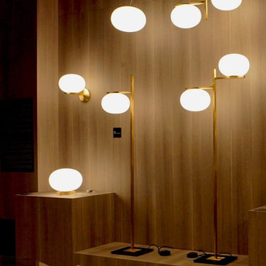 Oluce Alba 176 satin brass wall light ideal for contemporary living rooms and offices