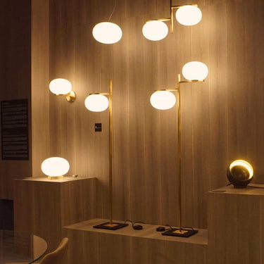 Alba 383 floor lamp with dual-arm polished opaline glass design for contemporary home or hotel interiors