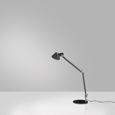 Artemide Tolomeo Mini table lamp in modern workspace with white finish and minimalist style