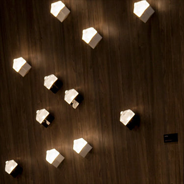 White Astro wall lamp by Oluce with molded glass shade for bedroom lighting