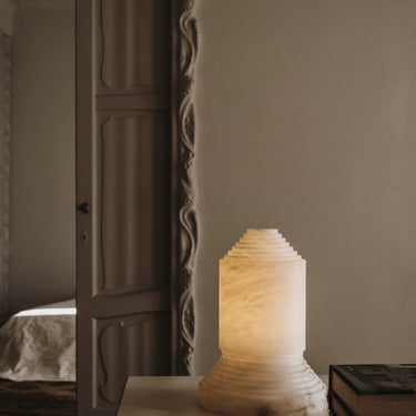 Modern Santa and Cole Babel Table Lamp illuminating contemporary space