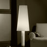 Contemporary wood table lamp with parchment shade and bronze base