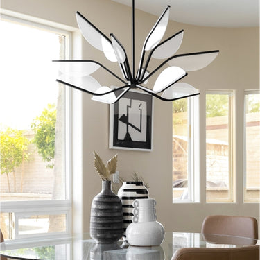 Sunny dining room with a black Belterra 38 lotus chandelier overhead