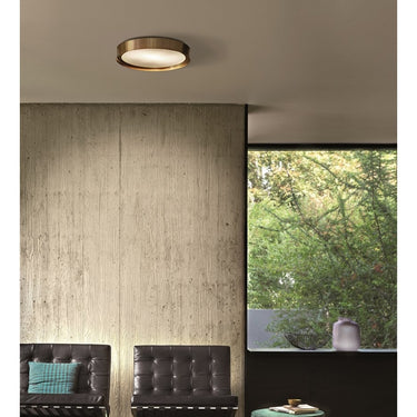 Brass Berlin 720 ceiling lamp by Oluce for living room lighting