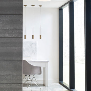 modern cylindrical pendant light, Captra model, aged brass finish,3 pendant installed