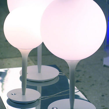 Artemide Castore Table Lamp Illuminating a Bedroom