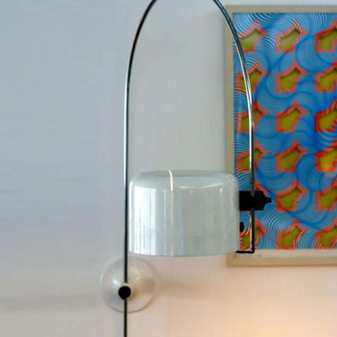 Coupé 1158 adjustable wall lamp by Oluce in black with pivoting aluminum dome shade