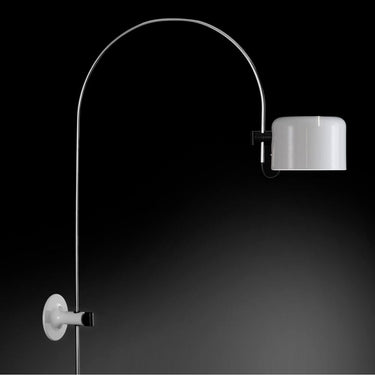 Chrome and aluminum wall sconce by Oluce for living room feature wall