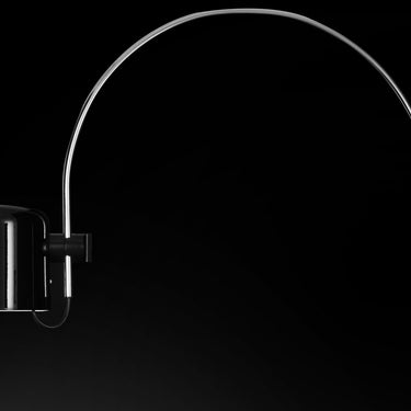 Modern Italian wall lamp with movable dome shade for task lighting