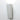 Artemide Cuneo Outdoor LED Wall Light illuminating a garden path, White