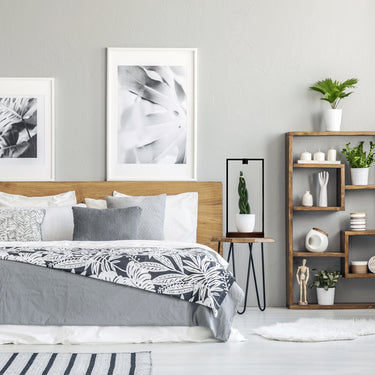 Rechargeable Table Lamp Creating Ambiance on a Bedroom, Plant Light