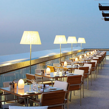 Neoz Egg portable table lamp, rechargeable battery, wireless ambient light for living room, award winner.