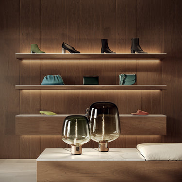 Detail of the precision-cut steel base on the Lodes Flar Large floor lamp by Lodes.