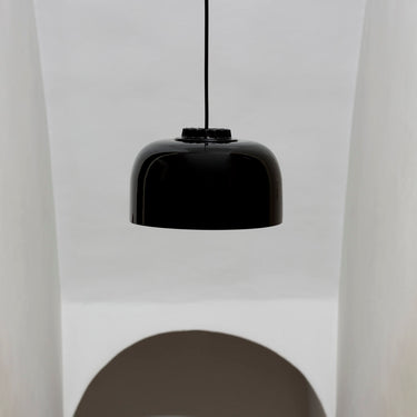 Contemporary pendant light with black canopy and handcrafted black shade