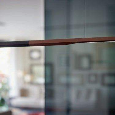 Dimmable Ilo 487 suspension lamp by Oluce in matt black and bronze for stylish office lighting
