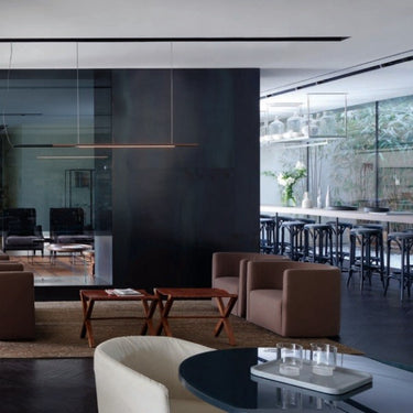 Sleek horizontal LED suspension lamp by Oluce Ilo 487 for hotel reception or lobby